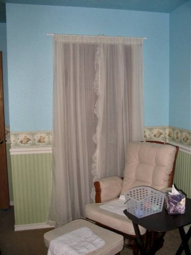 Removed the door and used sheer curtains instead.
