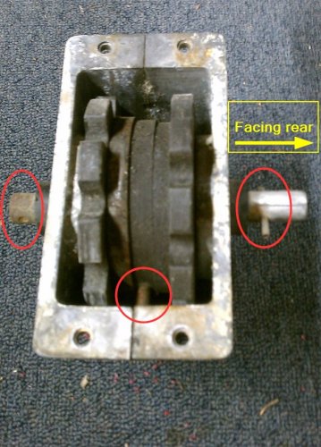 Reference:  Front gear box
Planetary pin on left side of box (bottom of picture), drive shaft with roll pin is on the right side of the picture.
