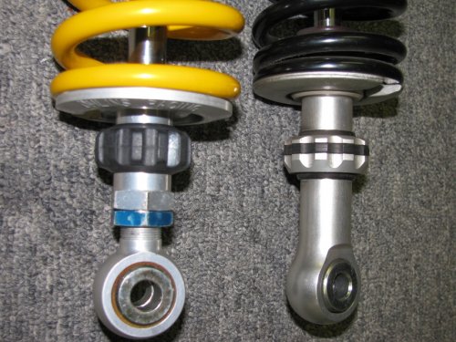 Detail 3
The Ohlins shock (left) has an adjustable lower mount as seen by the blue locking nut and threads.
