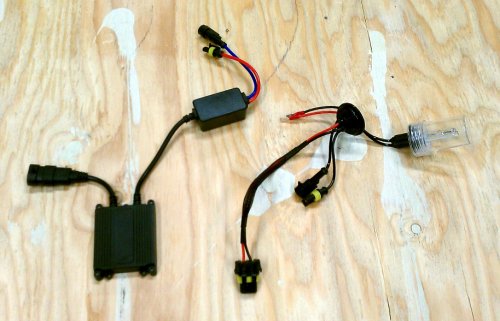 This is the complete kit.  The flat, squarish box to the left is the ballast while the rectangular box above it is the ignitor.  The bulb and wiring is to the right.

For removing the headlight see my album "[url=http://www.aircoolednut.com/cmgallery/thumbnails.php?album=157]Diavel headlight film install[/url]".
