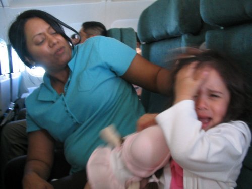 Bella causing Mommy & Daddy grief.
