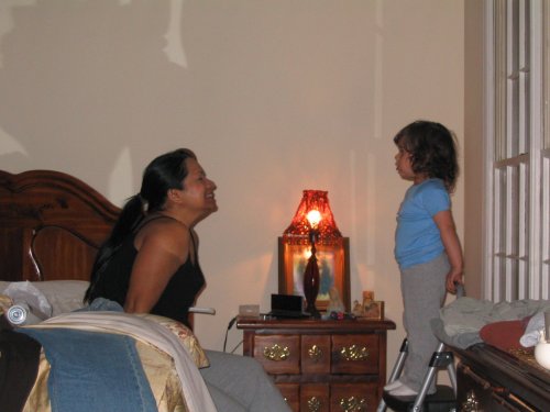 Mommy playing with Bella in Mimi's room.

