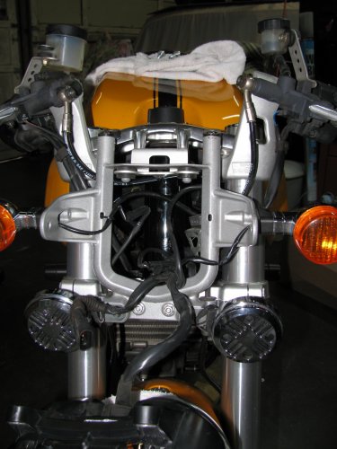 The view of the installed ladder and hi-risers.  Headlight goes back on and the gauge cluster and I'm ready to ride a little more comfortably.
