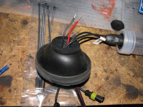 Here's the rubber boot turned inside-out to get a better view of the inside of the gasket and the wires running through it.
