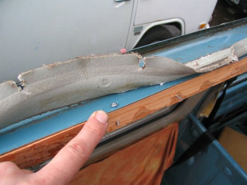 Three screws hold in the under framing.  What a bitch to get to this point just to remove them!
