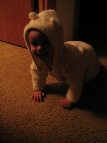Crawling around in her bear pajamas.
