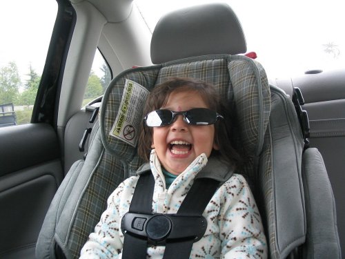 Bella wearing mommy's sunglasses on the way to Cannon Beach.
