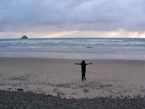 Antonette running out to hug the ocean.
