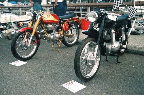 Perfect Pair
Red/gold motorcycle is a 1956 Mondial Sprint 175
Black/white motorcycle is a 1957 Mondial 175 TV
